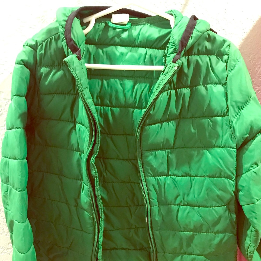 Green coat. Slight wear on zipper.